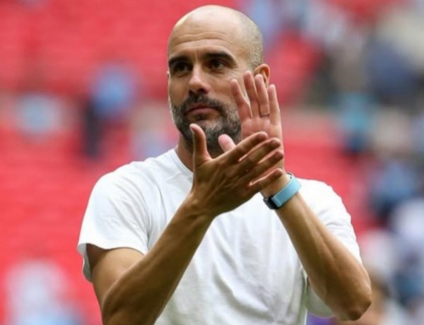 Pep Guardiola yahagaritswe imikino ibiri